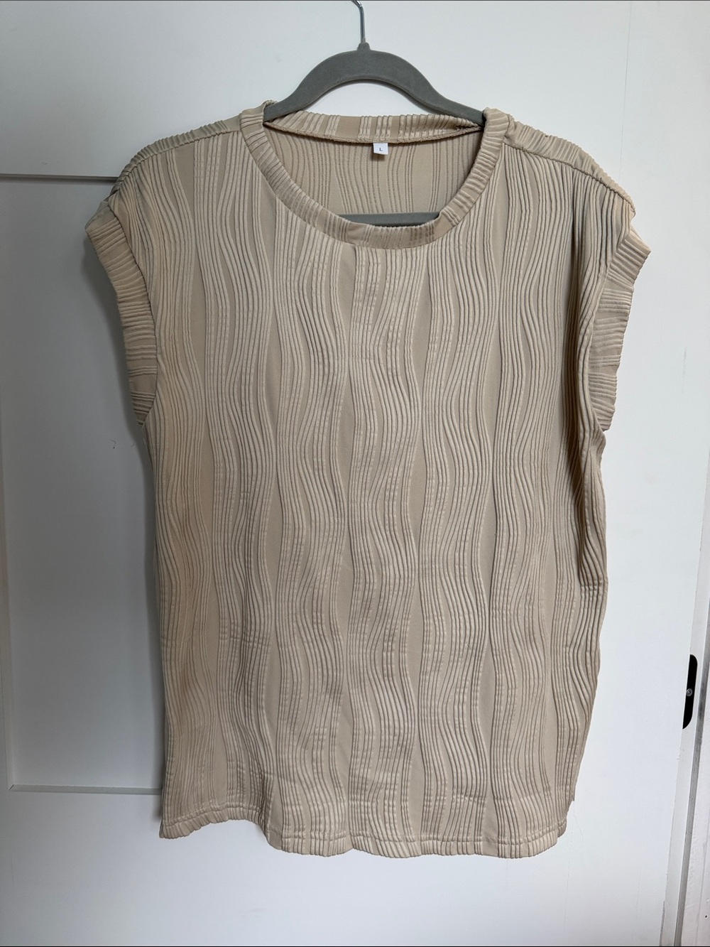 Sleeveless Textured Wave Knit Top in Beige